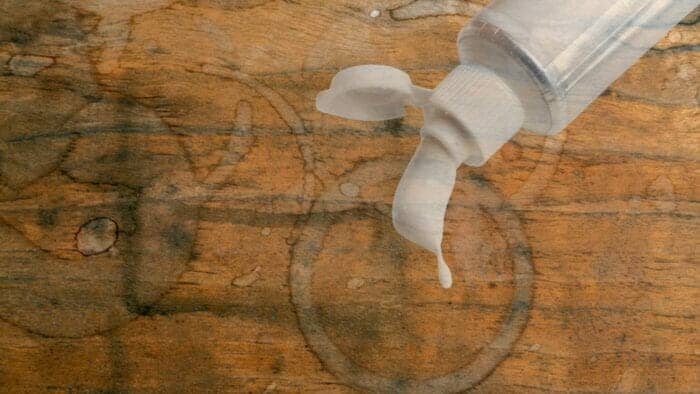 using toothpaste to remove water stains from wood